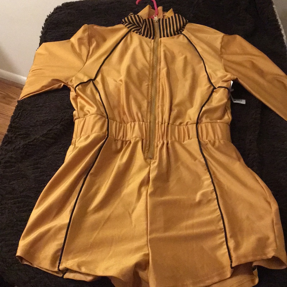 Gold and black one piece